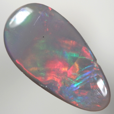 SOLID SEMI BLACK OPAL Large and bright red rolling flash turns to green in a Flame pattern